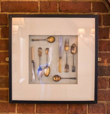 wall mounted vintage knives and forks